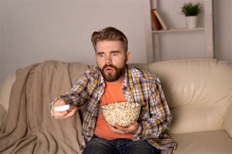 Single Man on the Couch Watching TV Stock Photo - Image of lonely ...