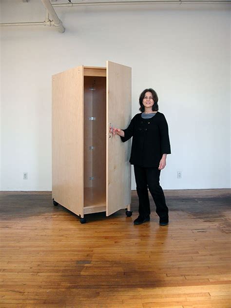 Art Studio Art Storage Furniture with locking door for storing fine art.