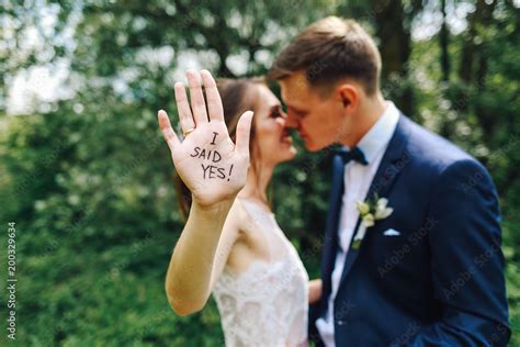 Funny wedding picture.Bride and groom. I sad yes Stock Photo | Adobe Stock