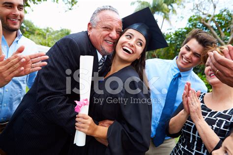 Hispanic Student And Family Celebrating Graduation Stock Photo ...