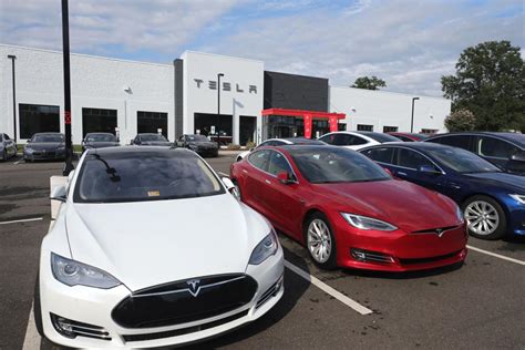 Electric automobile maker Tesla considering opening three more ...