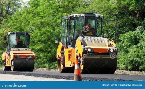 Repair of a Highway, Road Construction Works. Roller Compactor Machine ...