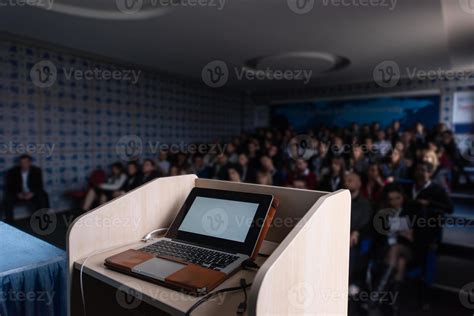 laptop computer at podium 10708806 Stock Photo at Vecteezy