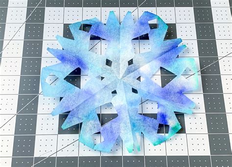 Coffee Filter Snowflakes for Winter Fun - DIY Candy