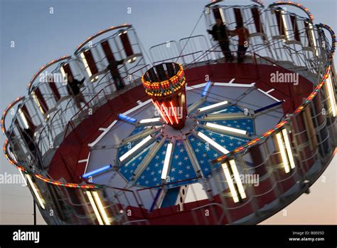 Spinning Round-Up Amusement Ride at Night Stock Photo, Royalty Free Image: 17517849 - Alamy