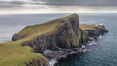 Neist Point Lighthouse In Isle Of Skye Scotland