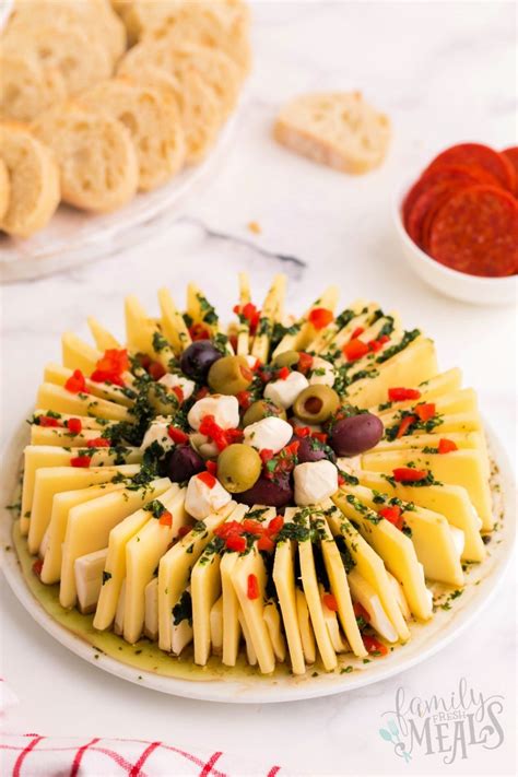 This marinated cheese ring is such an easy and fun way to add a bit of ...