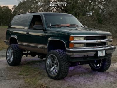 1995 Chevrolet Tahoe with 22x12 -44 RBP Silencer and 33/12.5R22 Road One Atheon Mtx and ...