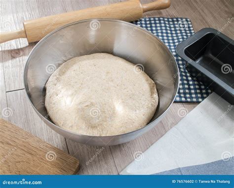 Bread Dough in Stainless Steel Bowl and Baking Utensils Stock Photo ...