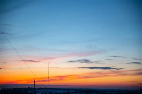 Premium Photo | View of winter sunset over snowed field