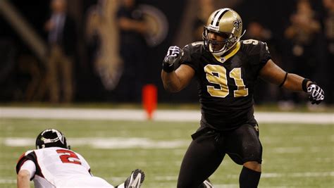 Former Saints DE Will Smith's career in photos