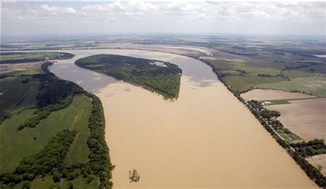 Mississippi River breaks levee, floods crops as rising waters move ...