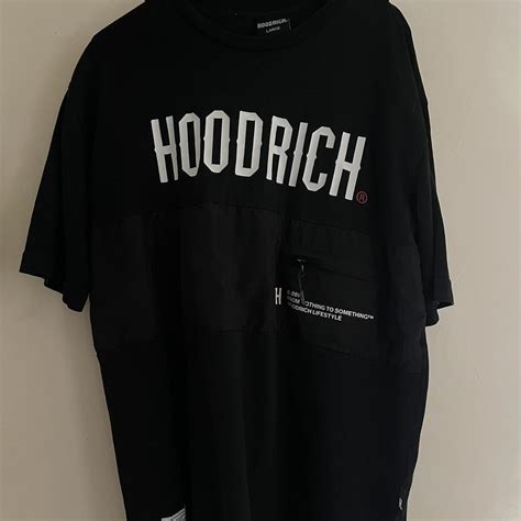 Hoodrich T-Shirt cracking on back logo, shown on... - Depop