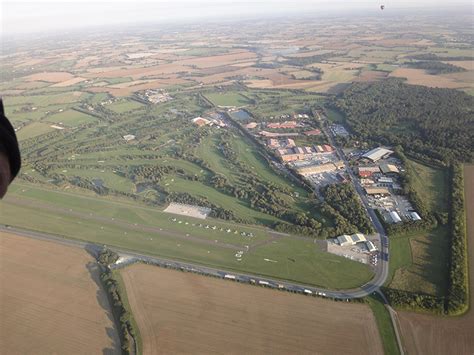 Aerial view of the Airfield and Golf Course as our balloon flight takes ...