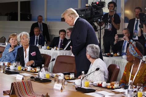 Trump G7 photo: At G7 summit, Germany's Angela Merkel leans over ...