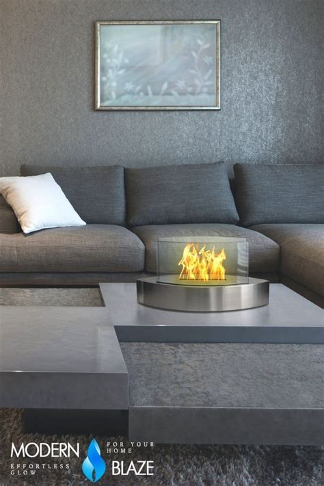 Modern tabletop fireplace with real flames. Availble in 5 colors to ...