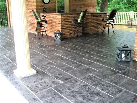 A worn-out concrete patio gets a second chance in life with a stamped overlay. We offer more ...