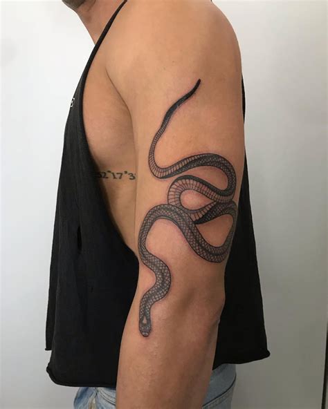 snake tattoo on arm | Tattoos, Cool arm tattoos, Snake tattoo