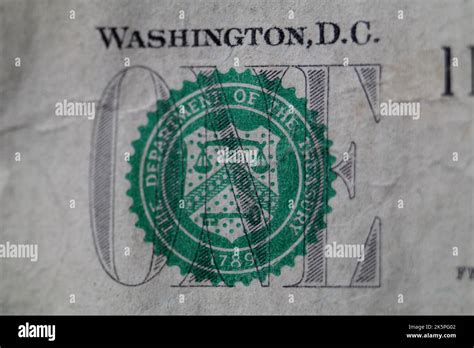 Close-up Detail From United States One Dollar Bill Showing The Department Of The Treasury Seal ...