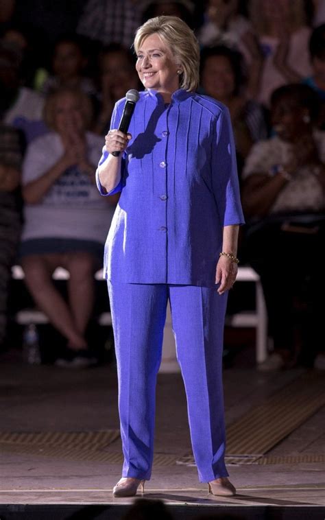 Hillary Clinton wears a Democrat blue pant suit to the first Democratic ...