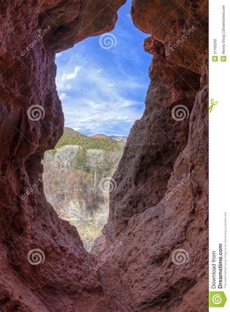 Red Rock cave stock photo. Image of green, clouds, stone - 21102592