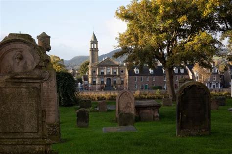 Woman rushed to hospital after being found 'unresponsive' in Inverness graveyard | The Scottish Sun