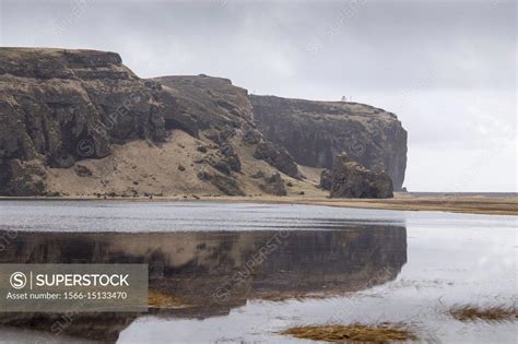 Dyrholaey lighthouse on the Dyrhólaey peninsula in Iceland - SuperStock