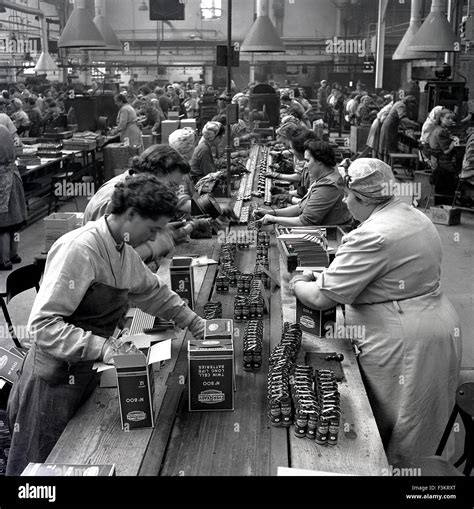 Historical, 1950s, female operatives working on the factory floor at ...