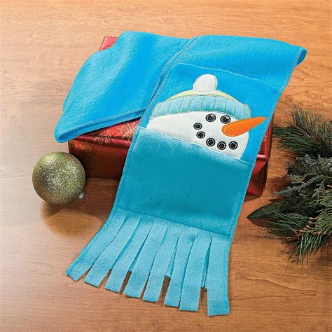 Snowman Scarf with Pockets | Snowman scarf, Fabric crafts, Frozen crochet