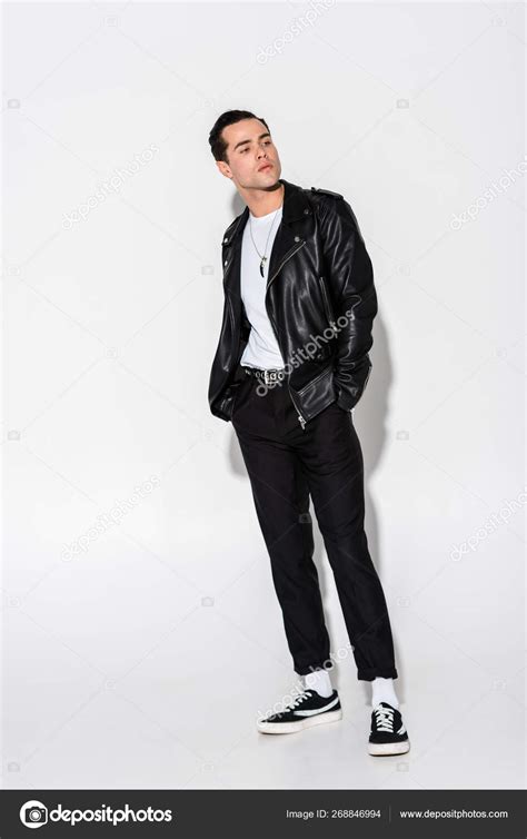 Handsome Man Leather Jacket Standing Hands Pockets White — Stock Photo © VitalikRadko #268846994