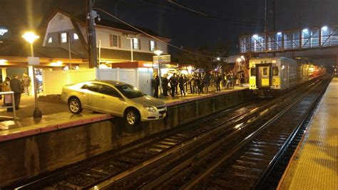 'Confused' driver ends up halfway on Mineola Long Island Rail Road ...