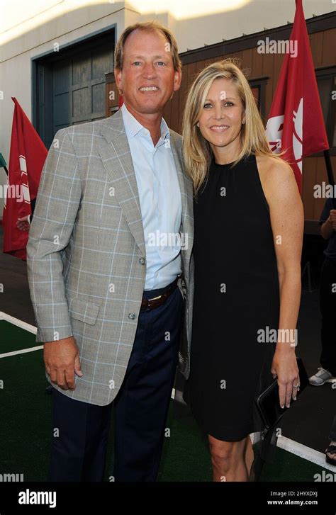 Rick Neuheisel and wife Susan Neuheisel| at the FOX Sports PAC-10 Conference Premiere held at ...