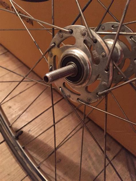 wheels - How do I remove the front axle from a sealed bearing hub ...