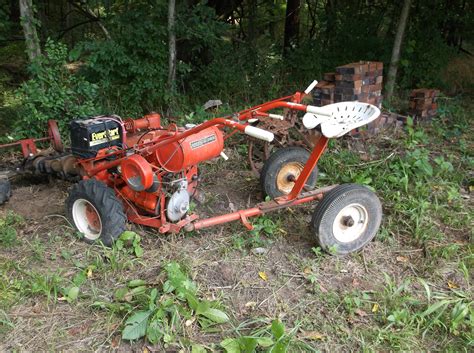 Gravely walk behind tractor and implements