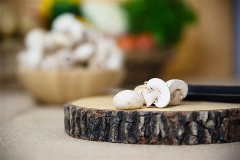 Fresh champignon mushroom vegetable in the kitchen - fresh mushroom vegetable cooking concept ...