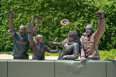 Statue of Green Bay Packers Fans Cheering for Their Football Team at Lambeau Field Editorial ...