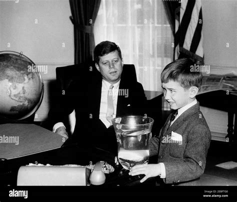 President Kennedy with Robert F. Kennedy, Jr. (RFK Jr.). President John F. Kennedy visits with ...