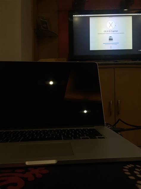 Apple MacBook Pro display shows black screen - Ask Different