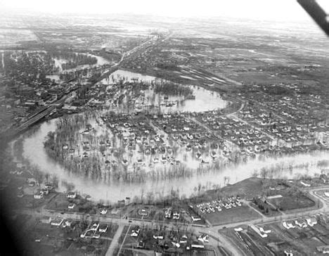 an aerial view of a city with flood waters