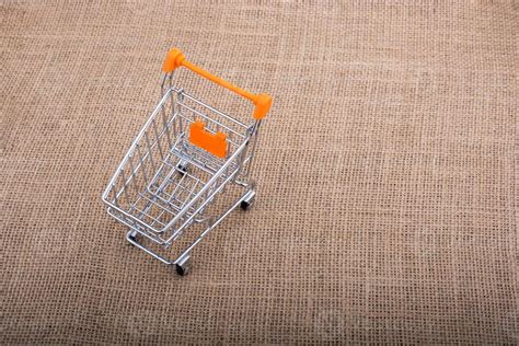 Shopping cart on canvas background 14511538 Stock Photo at Vecteezy