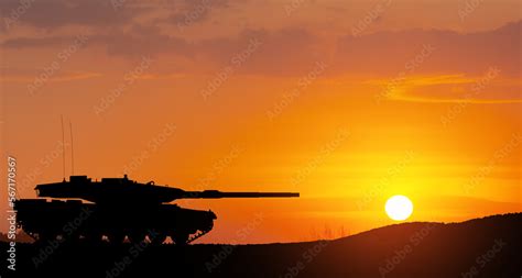 Silhouette of army tank at sunset sky background. Military machinery. Stock Photo | Adobe Stock