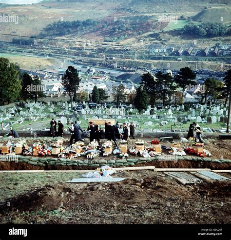 ABERFAN 1966: The mass funeral at Aberfan. Coffins arriving at the cemetery during the funeral ...