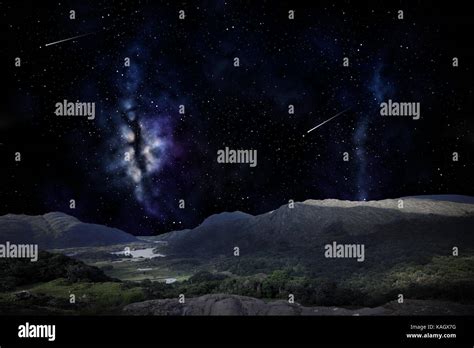 mountain landscape over night sky or space Stock Photo - Alamy