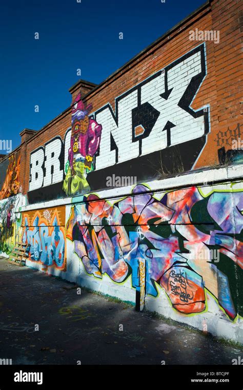 Graffiti of the word BRONX and two pieces on a brown brick wall in Munich, Germany Stock Photo ...