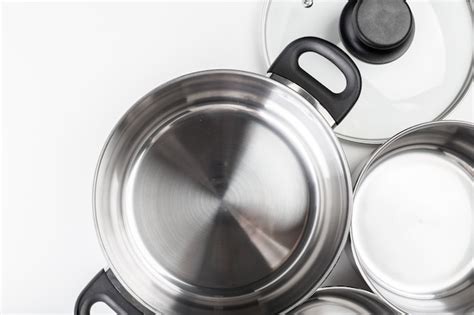 Premium Photo | Stainless steel pots and pans isolated on white