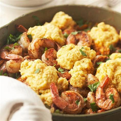 This Cajun Shrimp and Corn Bread Casserole is brimming with colorful vegetables and topped with ...