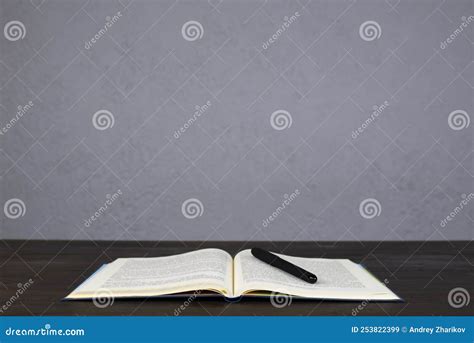 Open Bible. Holy Bible on the Table. Pen and Notepad. Stock Image ...