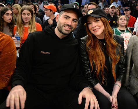 Lindsay Lohan and Husband Bader Shammas Smile as They Sit Courtside at New York Knicks Game