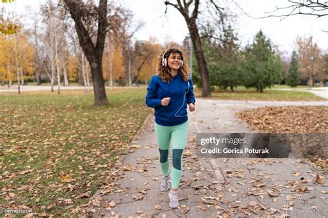 Female Runner Training High-Res Stock Photo - Getty Images