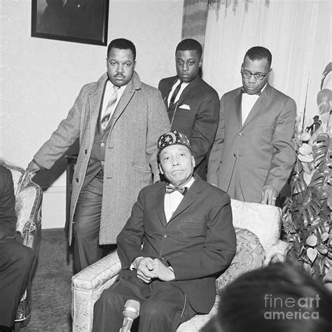 Elijah Muhammad And Bodyguards by Bettmann